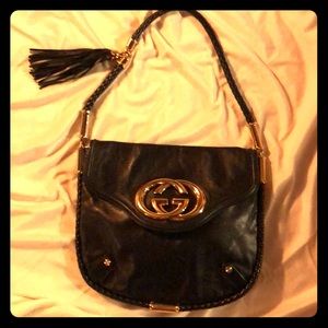 Stunning Gucci braided strap bag w tassel!